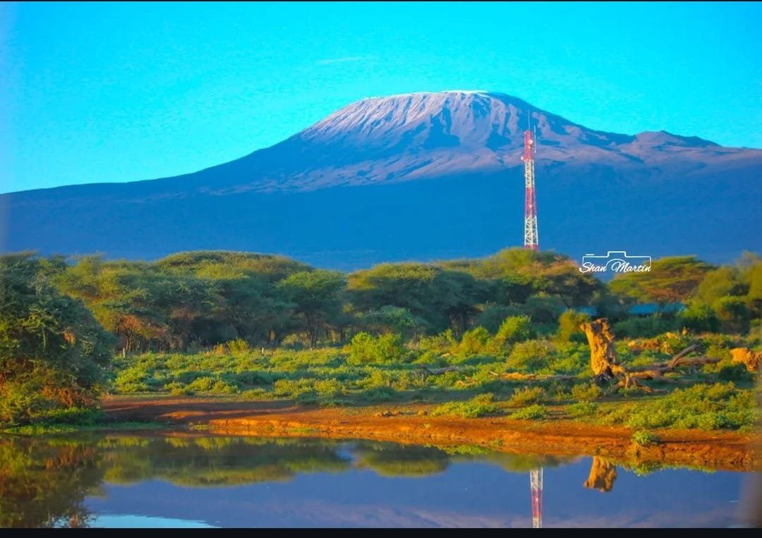 Mount Kilimanjaro above an Amboseli lake